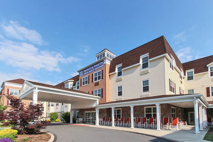 Exterior of senior living community with covered entrance